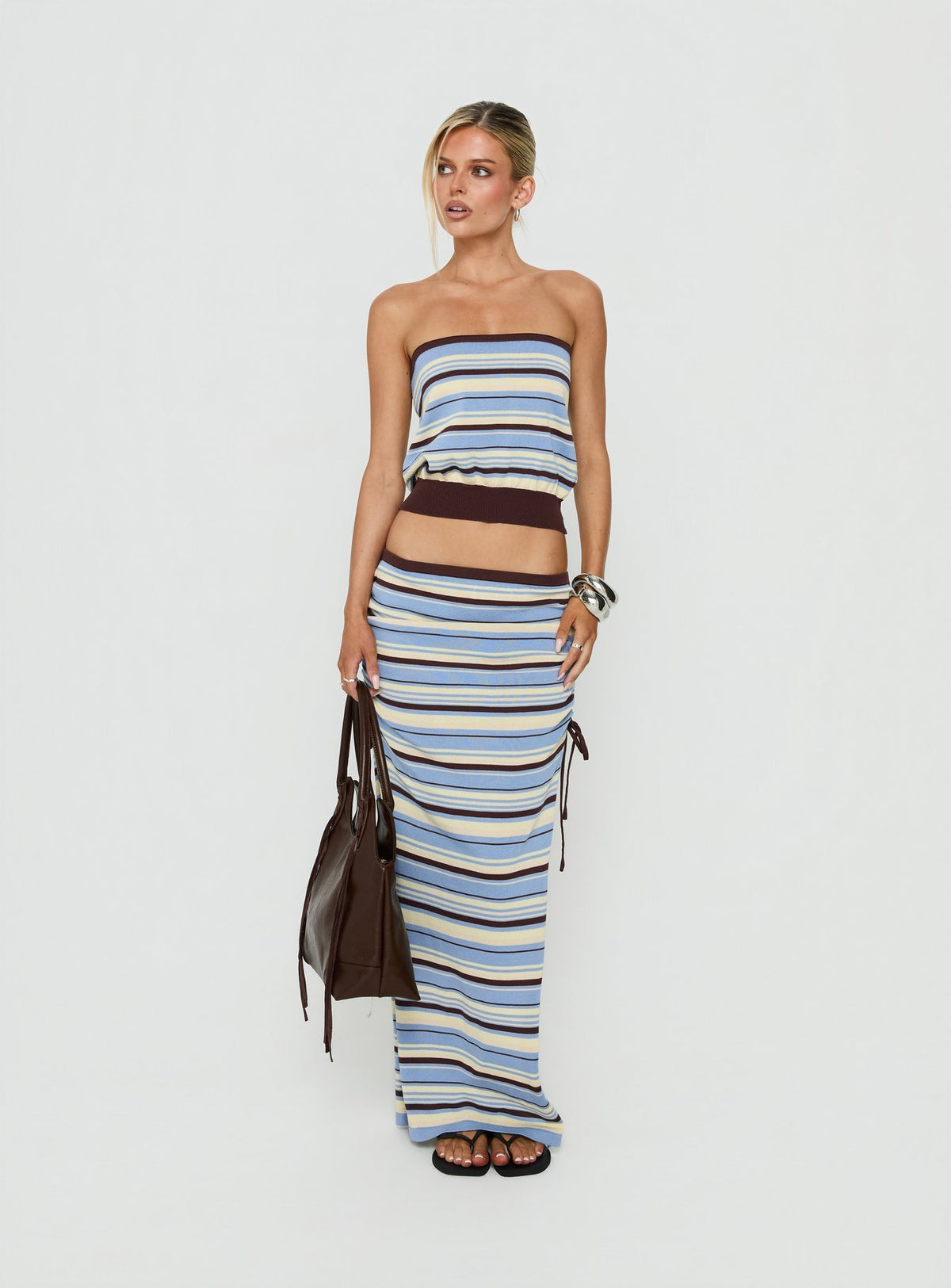 Featuring the Osamie Knit Drawstring Maxi Skirt Multi Stripe in womens-skirts with ruched details and fitted silhouette front view of model wearing Princess Polly