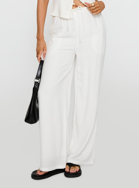 side view of model wearing Princess Polly Parklea Pants White Tall 