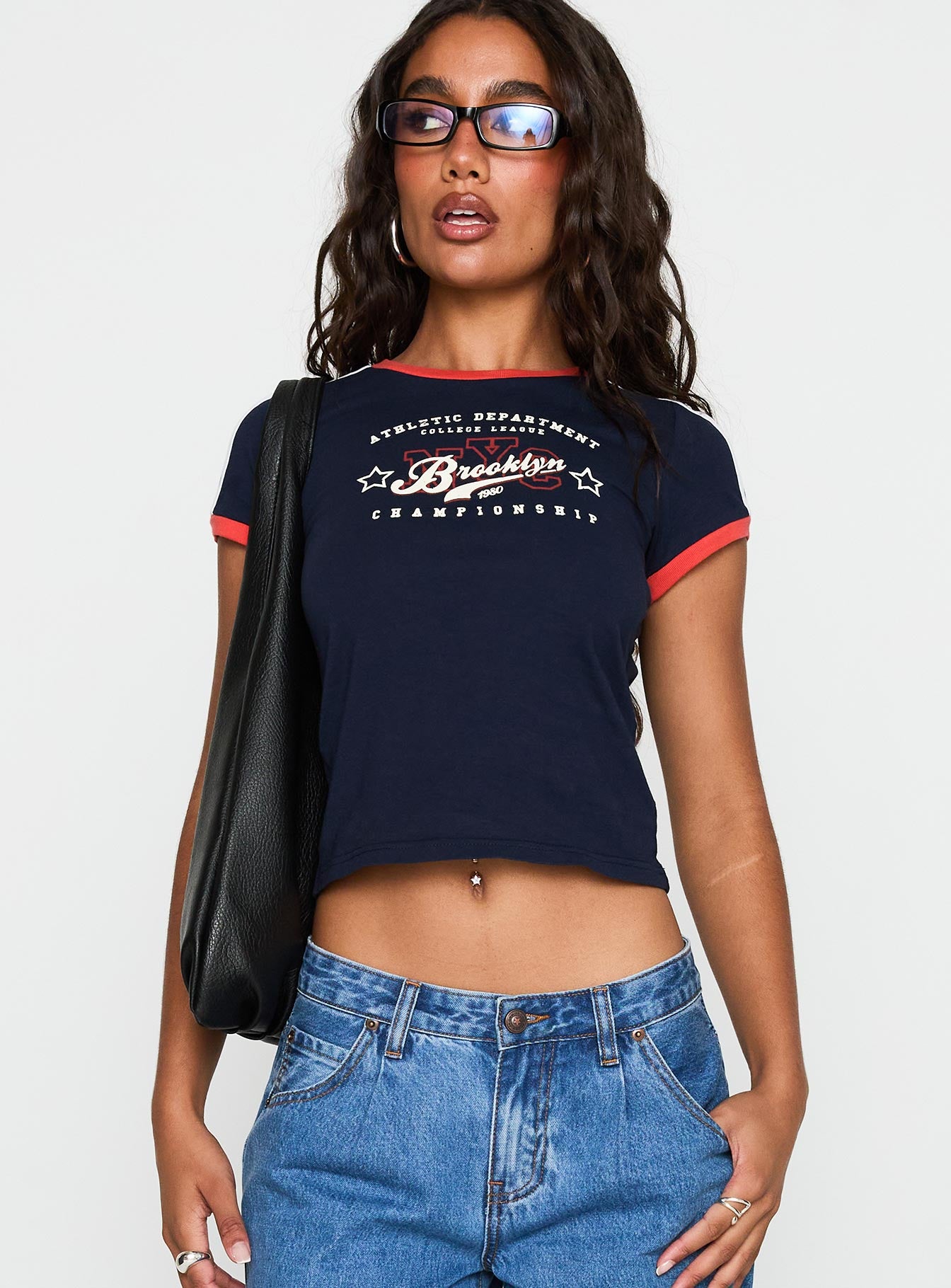 front view of model wearing Princess Polly So Brooklyn Graphic Tee Blue Short Sleeves Crew Neck 