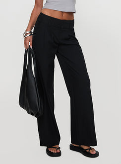 back view of model wearing Princess Polly Two Lovers Low Rise Pants Black Petite Low Rise Pants 