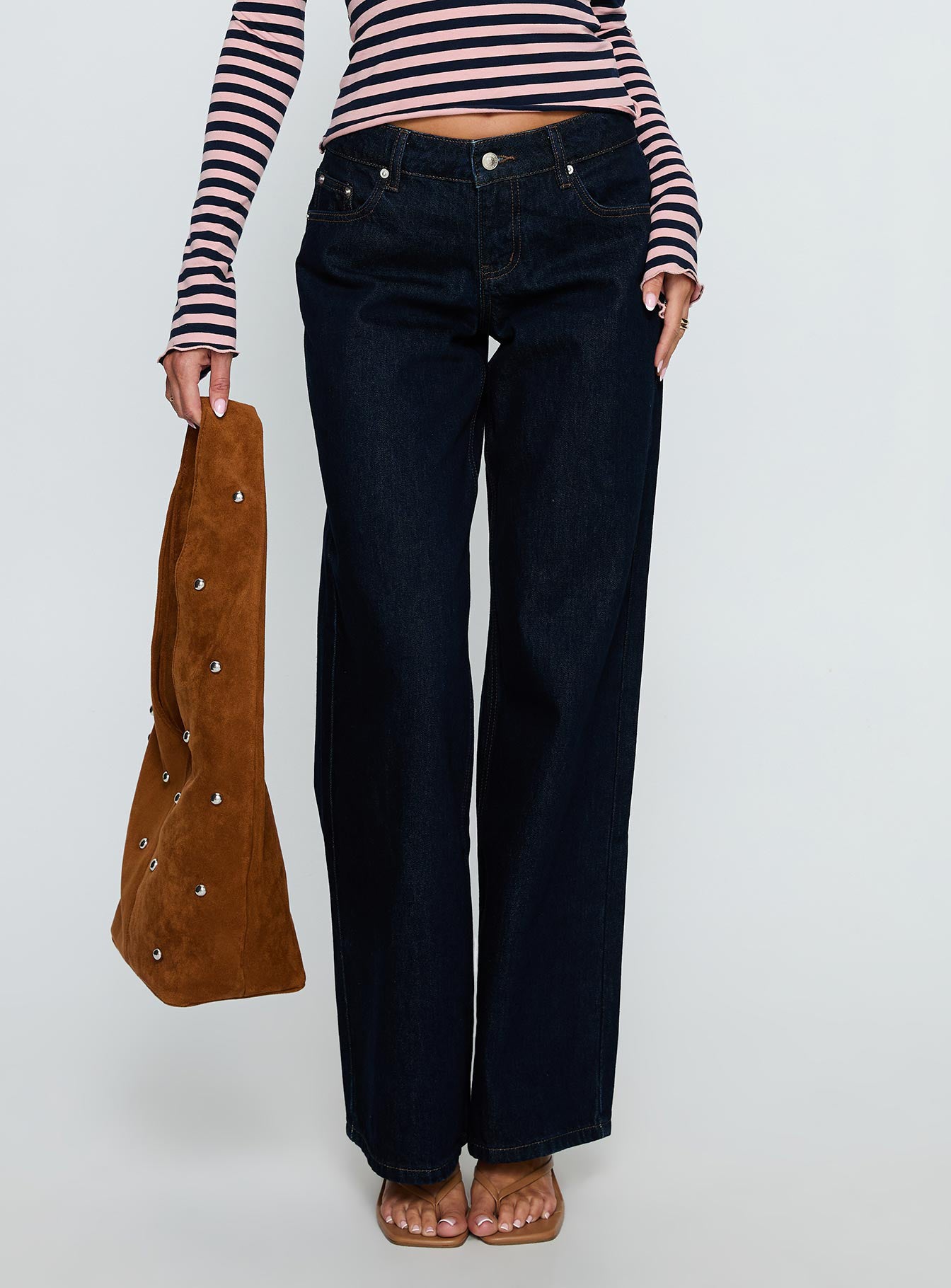 back view of model wearing Princess Polly Ellanor Low Rise Straight Leg Jeans Indigo Blue Low Rise Jeans 