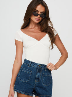 front view of model wearing Princess Polly Loveydove Short Sleeve Bodysuit White Short Sleeve Bodysuit 