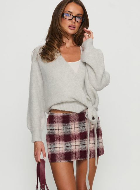   side view of model wearing Princess Polly Charmers Mini Skirt Red Check Mini Skirts Skirts 