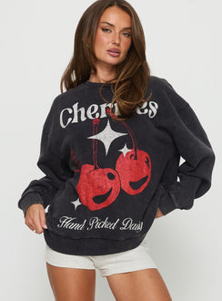 front view of model wearing Princess Polly Hand Picked Graphic Jumper Black 