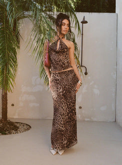   side view of model wearing Princess Polly Eleganza Maxi Skirt Leopard Maxi 