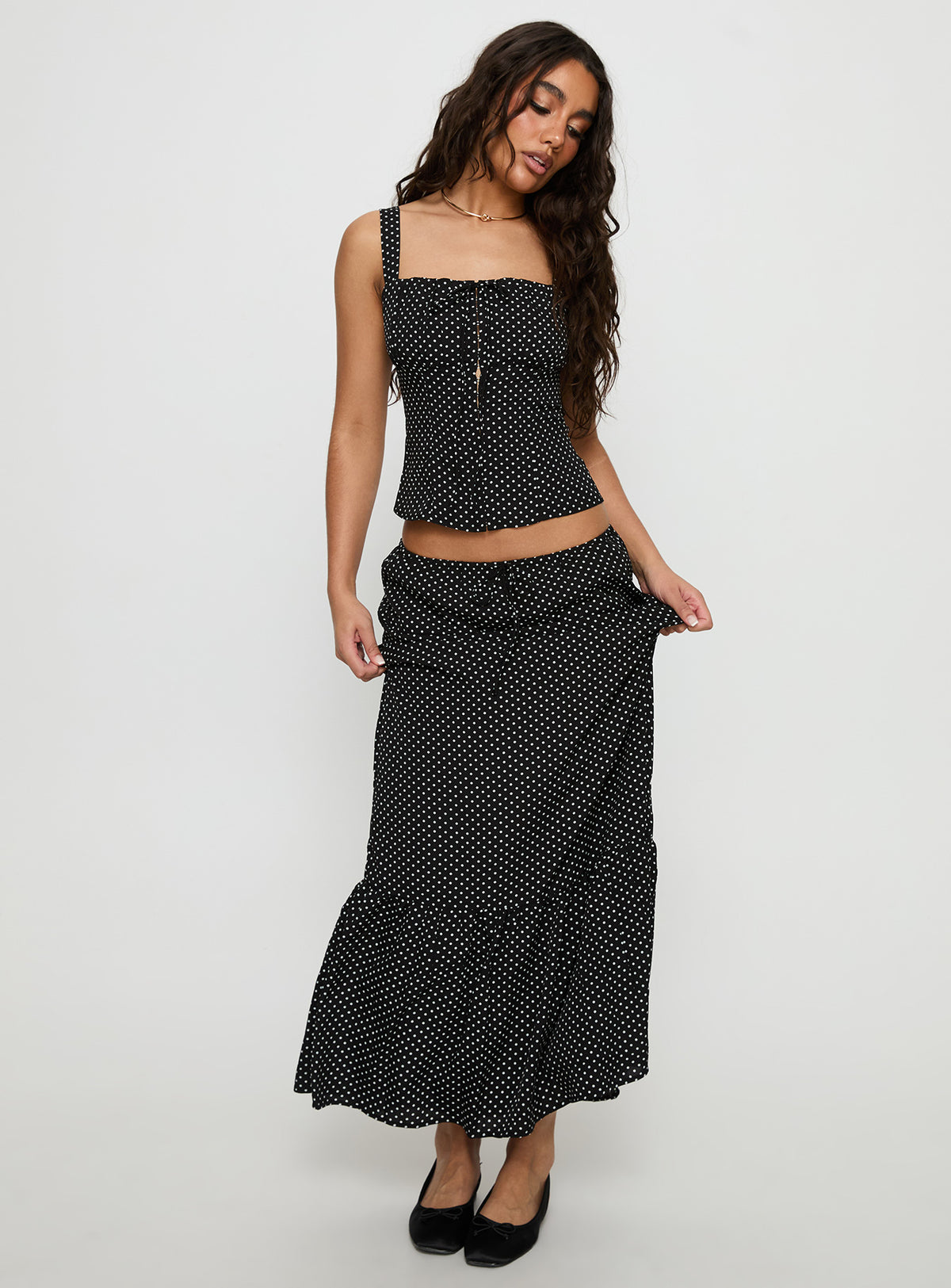   front view of model wearing Princess Polly Modern Girl Maxi Skirt Black / Polka Dot Skirts 