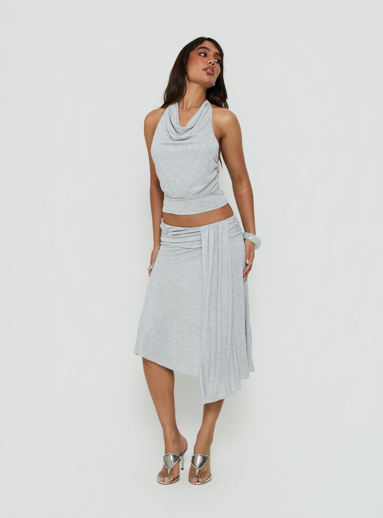 Showcasing the Iselda Draped Midi Skirt Grey Marle in womens-skirts with wrap detail and relaxed fit front view of model wearing Princess Polly