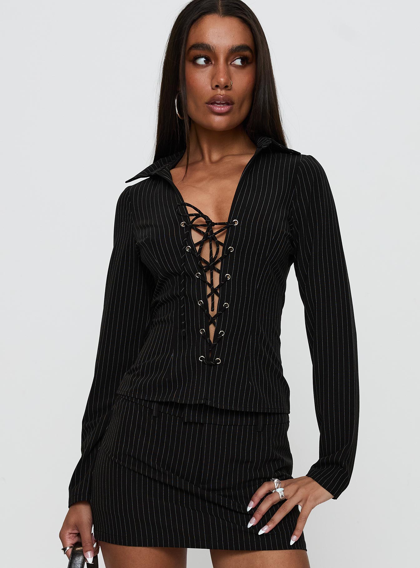 front view of model wearing Princess Polly Feminique Tie Up Long Sleeve Top Black Stripe Full Sleeves Plunger 