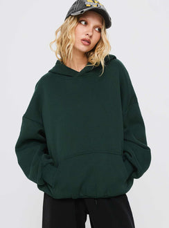 front view of model wearing Princess Polly Good Luck Graphic Hoodie Green / Blue Longline Jumpers Jumpers 