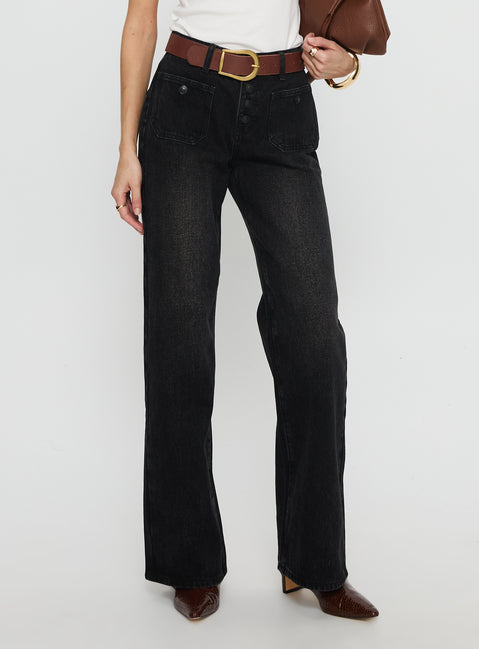 side view of model wearing Princess Polly Carianne Low Rise Wide Leg Jeans Washed Black Mid Rise Jeans 