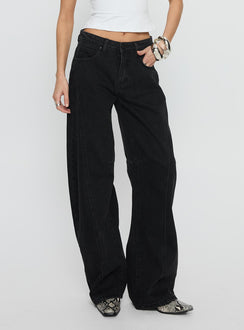 side view of model wearing Princess Polly Lost Track Mid Rise Barrel Leg Jeans Washed Black Mid Rise Jeans 