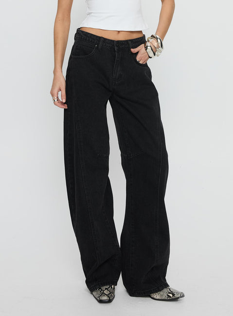 side view of model wearing Princess Polly Lost Track Mid Rise Barrel Leg Jeans Washed Black Mid Rise Jeans 