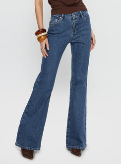 front view of model wearing Princess Polly Magic Mirror Mid Rise Bootleg Jeans Mid Blue Wash Mid Rise Jeans 