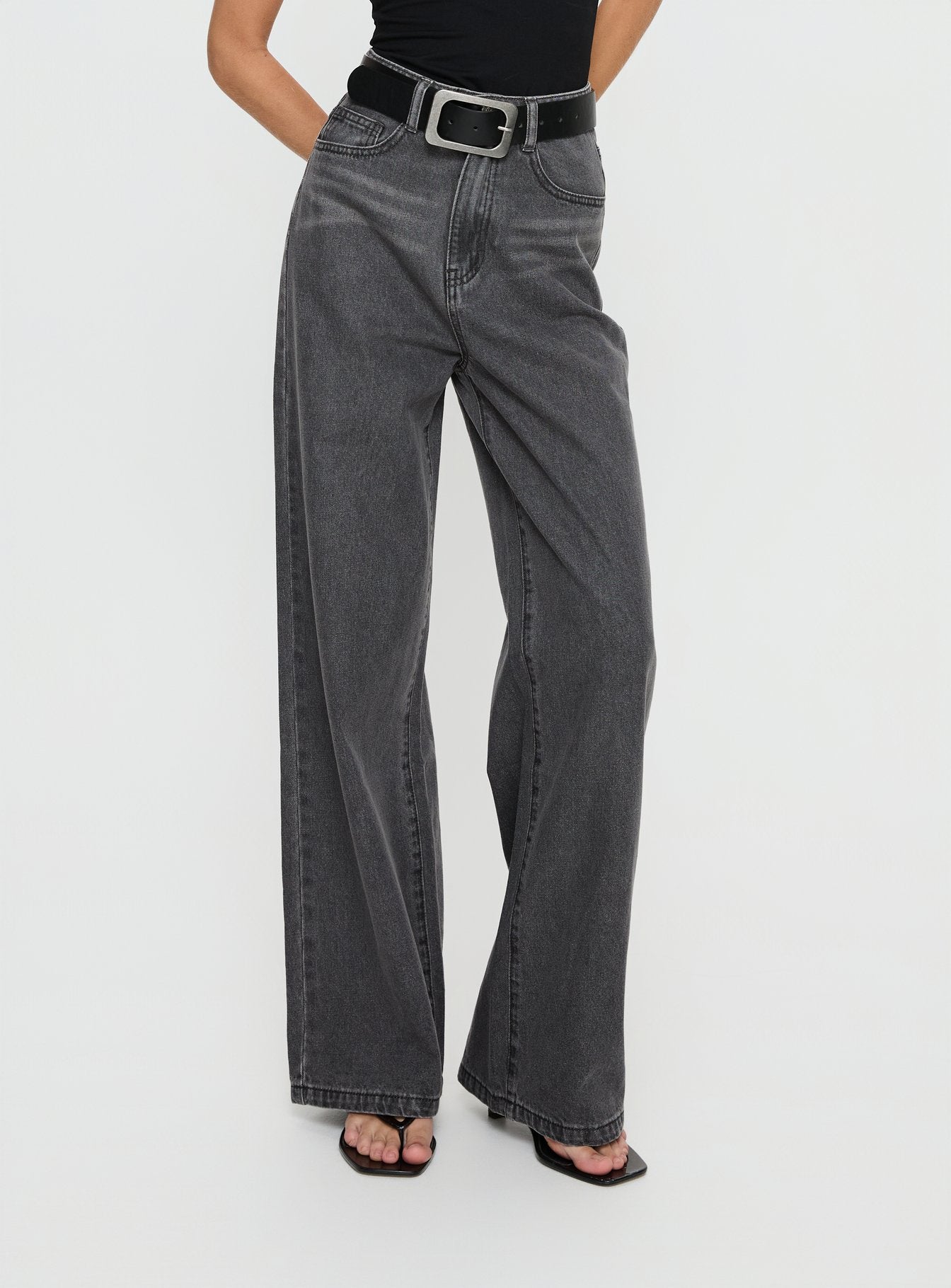 side view of model wearing Princess Polly Nicolo High Rise Straight Leg Jeans Washed Grey High Rise Jeans 