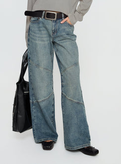 side view of model wearing Princess Polly Atmosphere Mid Rise Straight Leg Jeans Antique Wash Low Rise Jeans 
