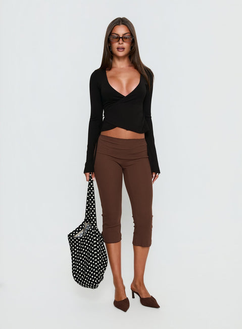 back view of model wearing Princess Polly Baseline Rib Capri Pants Chocolate Mid Rise Pants 
