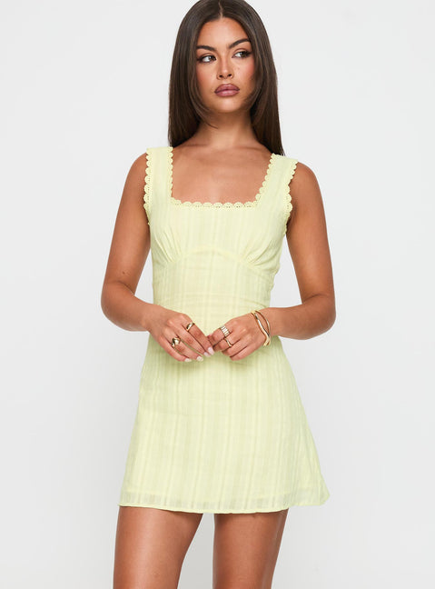 front view of model wearing Princess Polly Dasha Mini Dress Lemon Square Neck 