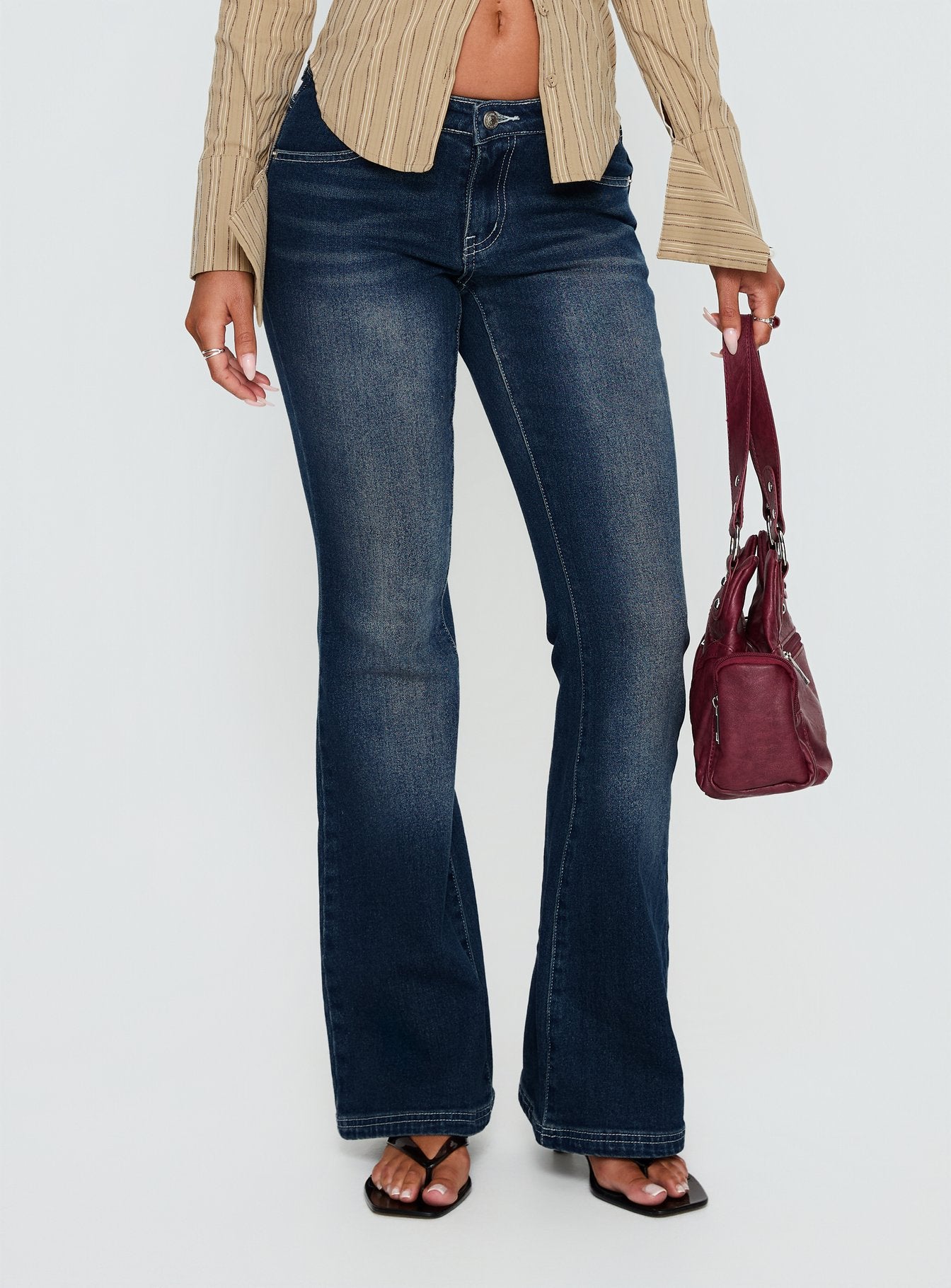 front view of model wearing Princess Polly Zilvia Bootleg Mid Rise Jeans Raw Denim Mid Rise Jeans 