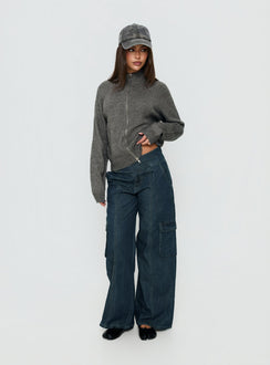 Showcasing the Nikoletta Mid Rise Wide Leg Cargo Jeans Dark Blue Wash in womens-jeans with mid-rise front view of model wearing
