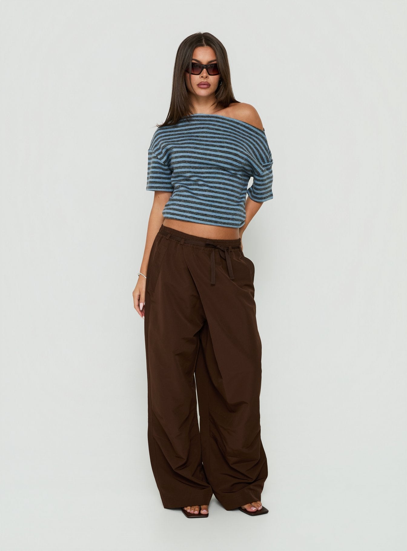 Discover the Signora Elasticated Waist Pants Chocolate womens-regular-pants featuring high-rise wide-leg design front view of model wearing Princess Polly