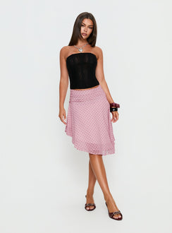   side view of model wearing Princess Polly Evanescence Asymmetrical Midi Skirt Pink Polka Dot Midi Skirts Skirts 