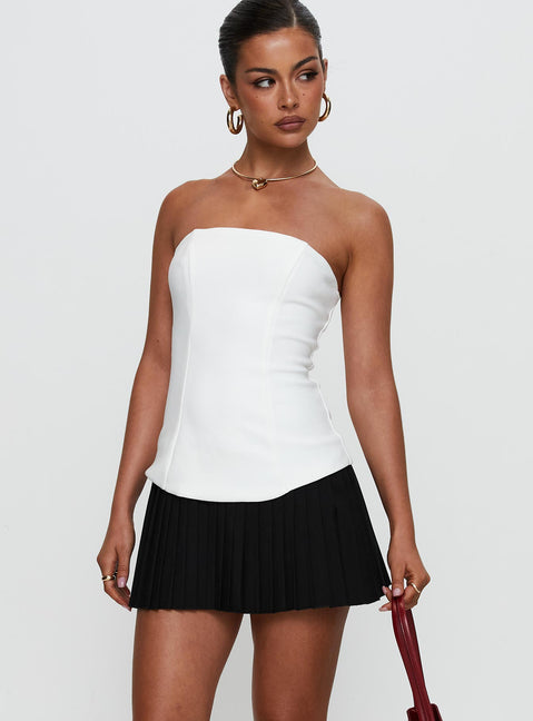 side view of model wearing Princess Polly Obsessed Strapless Mini Dress White Straight Neck 