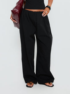 side view of model wearing Princess Polly Tidekiss Pants Noir Mid Rise Pants 