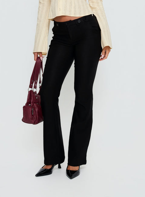 side view of model wearing Princess Polly Dariana Flare Pants Black Mid Rise Pants 