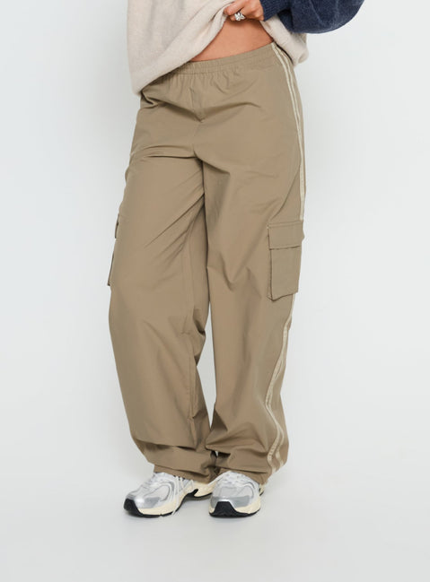 back view of model wearing Princess Polly Ellyn Baggy Cargo Pants Khaki Mid Rise Pants 