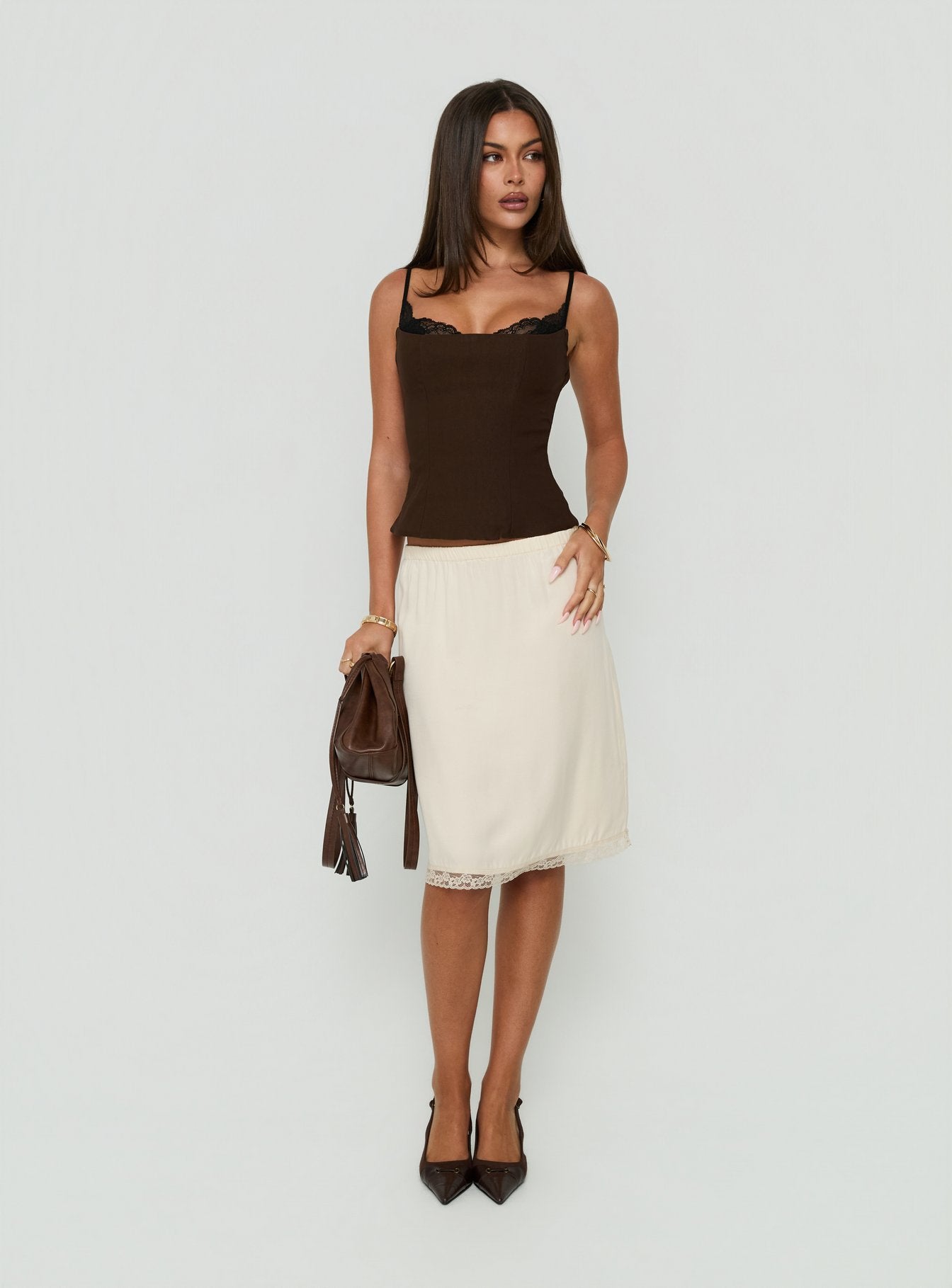 Shop the Bella Lace Trim Midi Skirt Butter in womens-skirts with midi length front view of model wearing