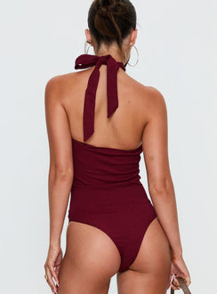 back view of model wearing Princess Polly Bridey Cut Out Bodysuit Red Sleeveless 