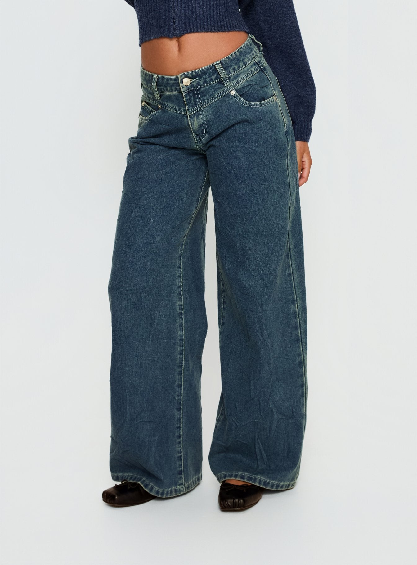 side view of model wearing Princess Polly Shanna Relaxed Low Rise Jeans Acid Raw Wash Mid Rise Jeans 