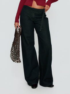 side view of model wearing Princess Polly Boxie Mid Rise Wide Leg Jeans Washed Black Mid Rise Jeans 
