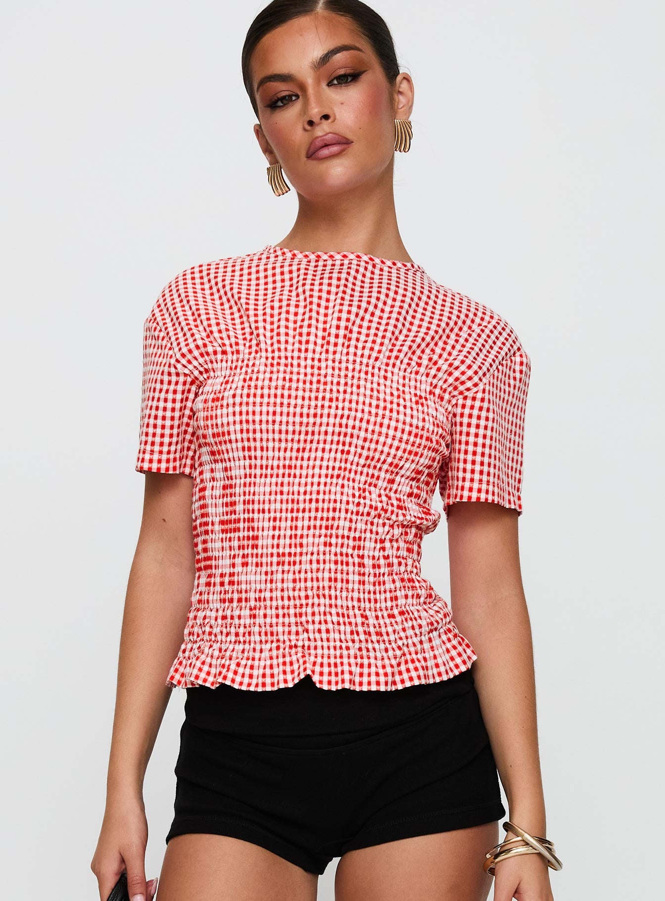 back view of model wearing Princess Polly Maybe Tomorrow Ruched Top Red Check Short Sleeves High Neck 