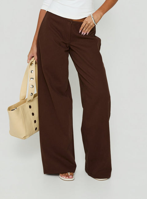Featuring the Hereos Mid Rise Baggy Leg Jeans Washed Chocolate in womens-jeans front view of model wearing Princess Polly