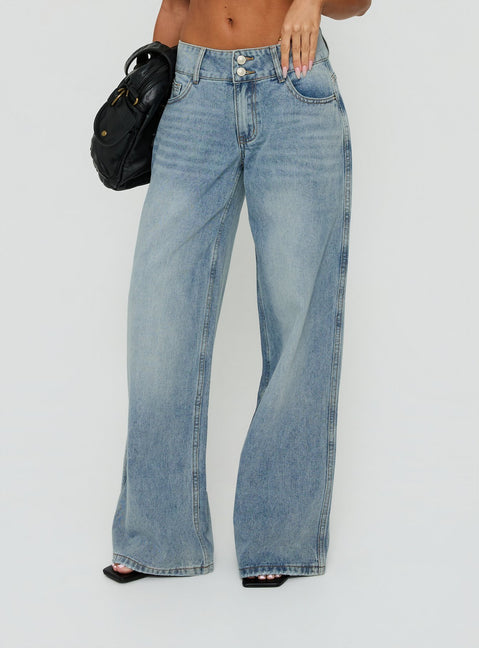 Crafted from Ramos Low Rise Double Button Wide Leg Jeans Light Vintage Blue womens-jeans featuring low-rise detail front view of model wearing