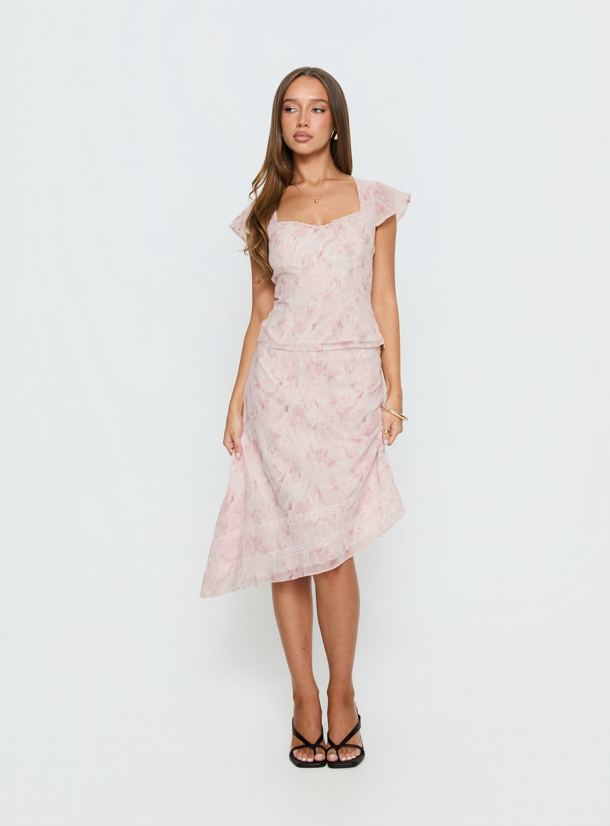   front view of model wearing Princess Polly Avaline Asymmetrical Midi Skirt Pink 
