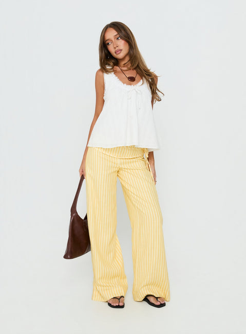 front view of model wearing Princess Polly Silver Moon Pants Yellow Stripe Low Rise Pants 