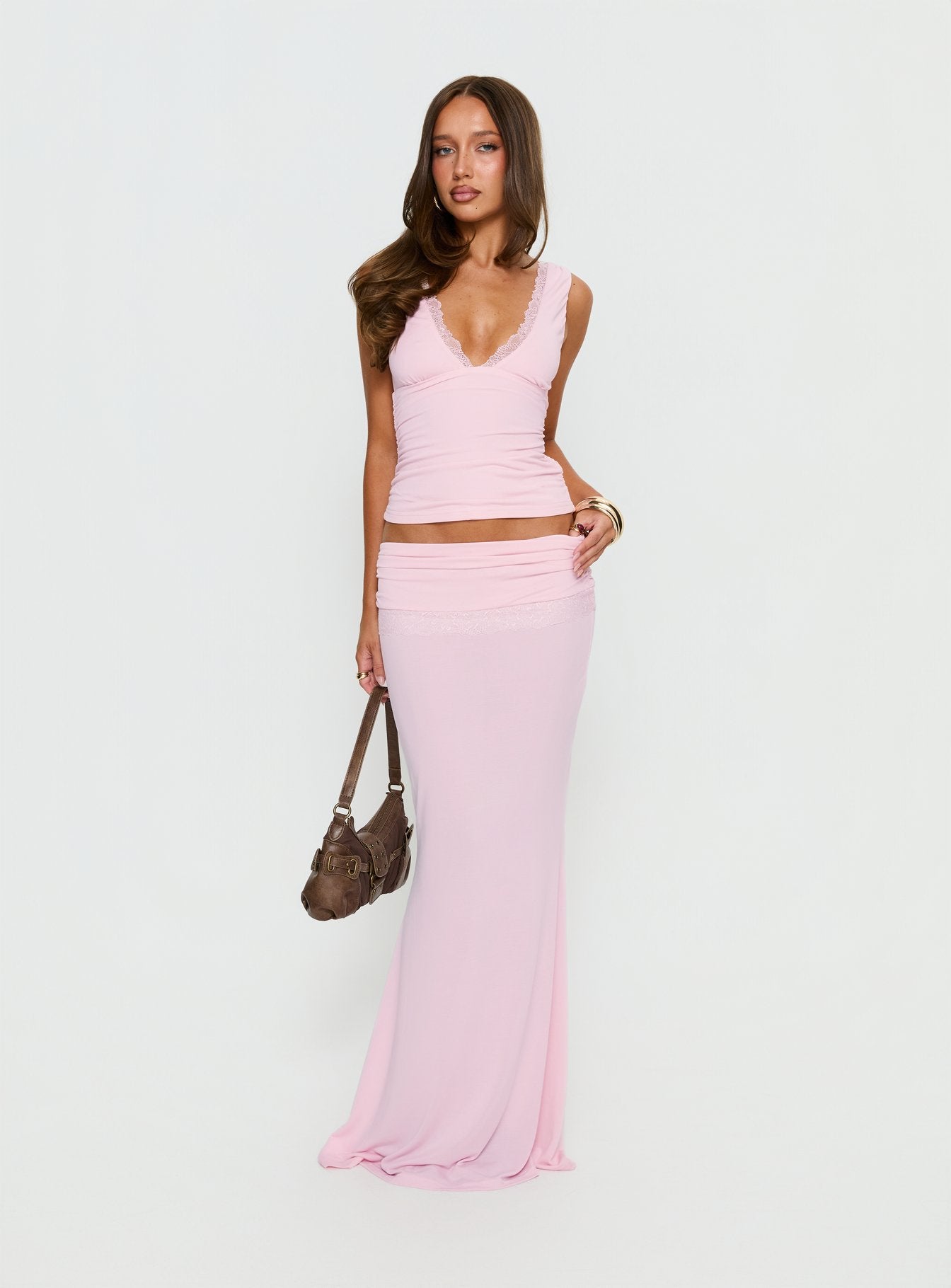 back view of model wearing Princess Polly Zespri Jersey Maxi Skirt Pink Maxi Skirts 