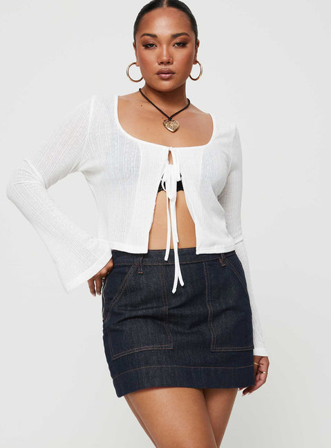   front view of model wearing Princess Polly Hughes Mini Skirt Dark Wash Denim Petite Mini Skirts 