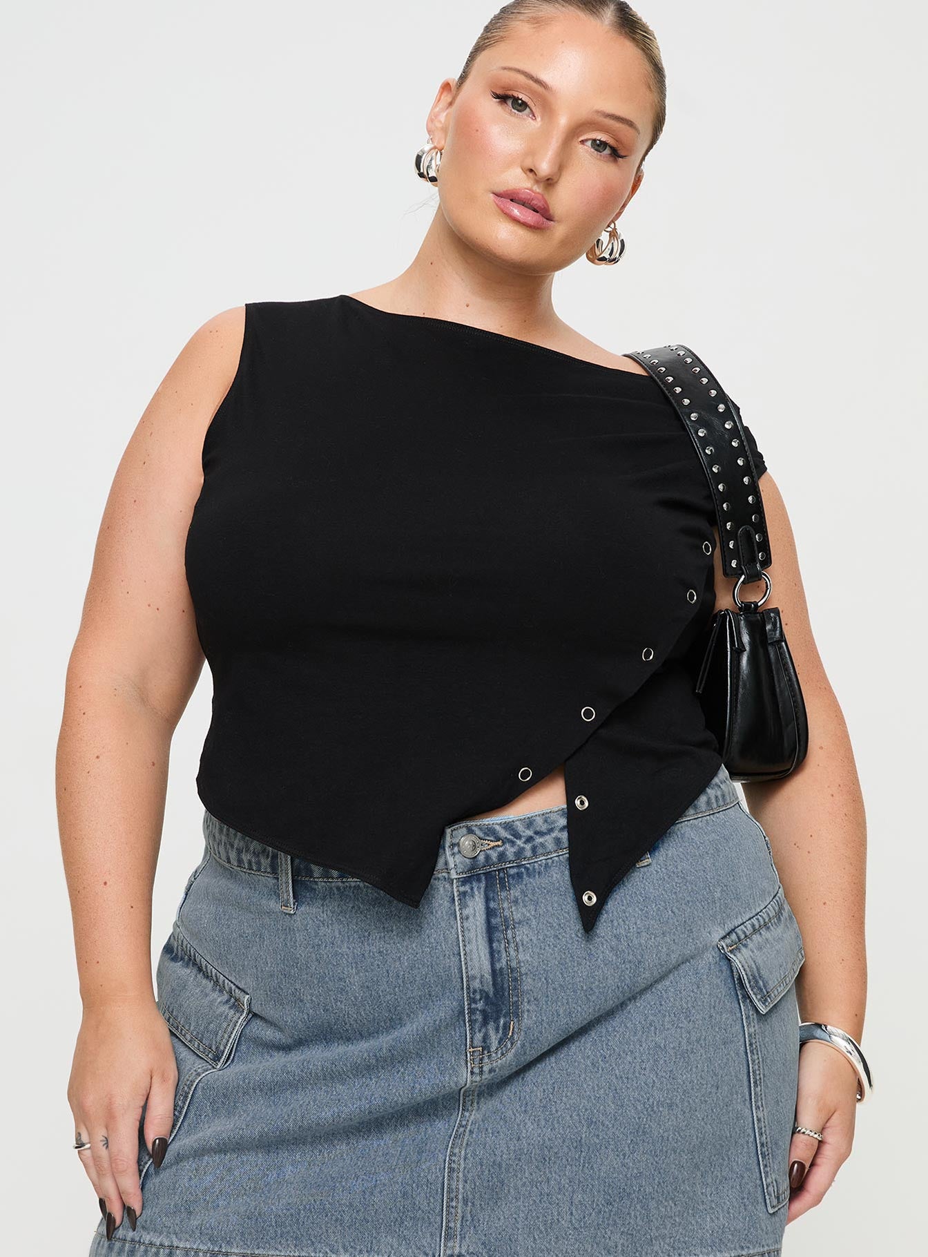 front view of model wearing Princess Polly Karre Off The Shoulder Top Black Curve Sleeveless Asymmetric Neckline 