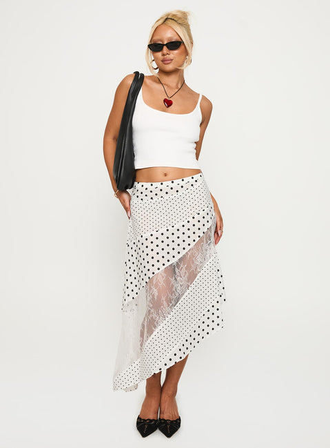   side view of model wearing Princess Polly Rennar Maxi Skirt White / Polka Dot Midi Skirts 