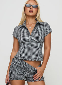 front view of model wearing Princess Polly Covey Shirred Puff Sleeve Top Multi Short Sleeves High Neck 