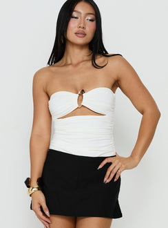 Featuring the See Me Soon Strapless Hardware Detail Bodysuit White with sleeveless styling front view of model wearing Princess Polly