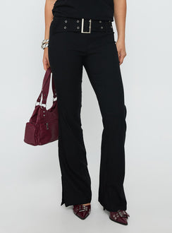 back view of model wearing Princess Polly Kortnee Eyelet Detail Flare Leg Pants Black Low Rise Pants 