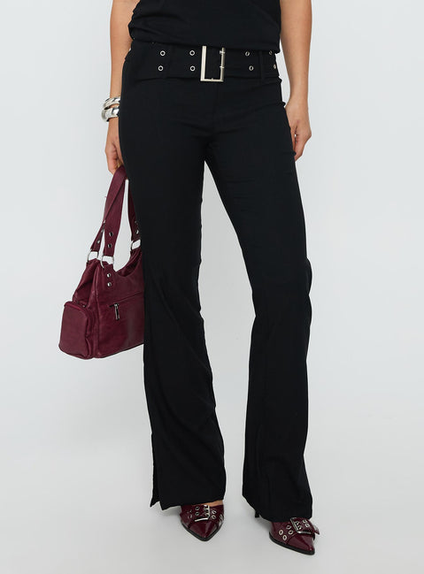 back view of model wearing Princess Polly Kortnee Eyelet Detail Flare Leg Pants Black Low Rise Pants 