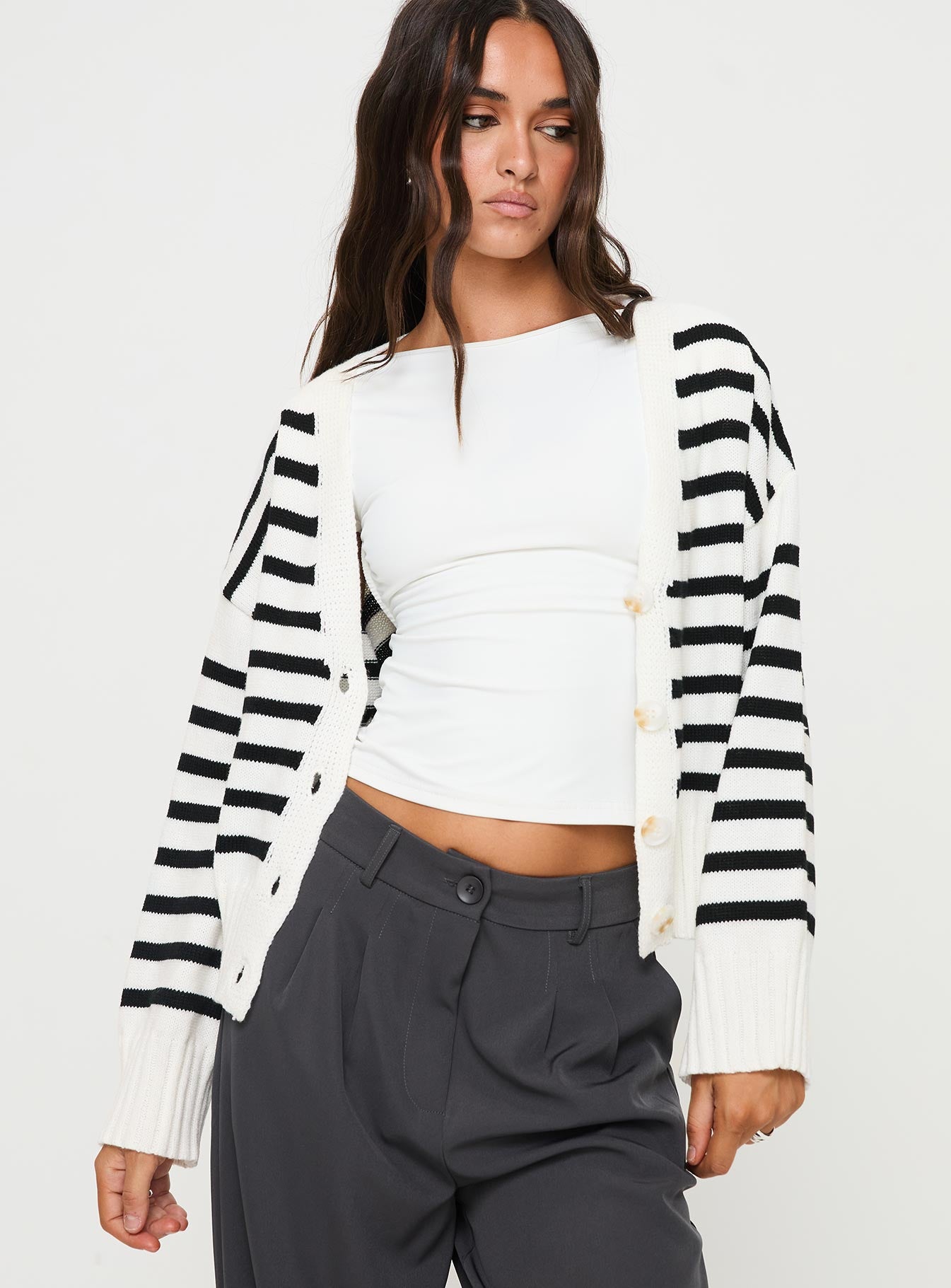 back view of model wearing Princess Polly Karlson Striped Cardigan Cream / Black cropped 