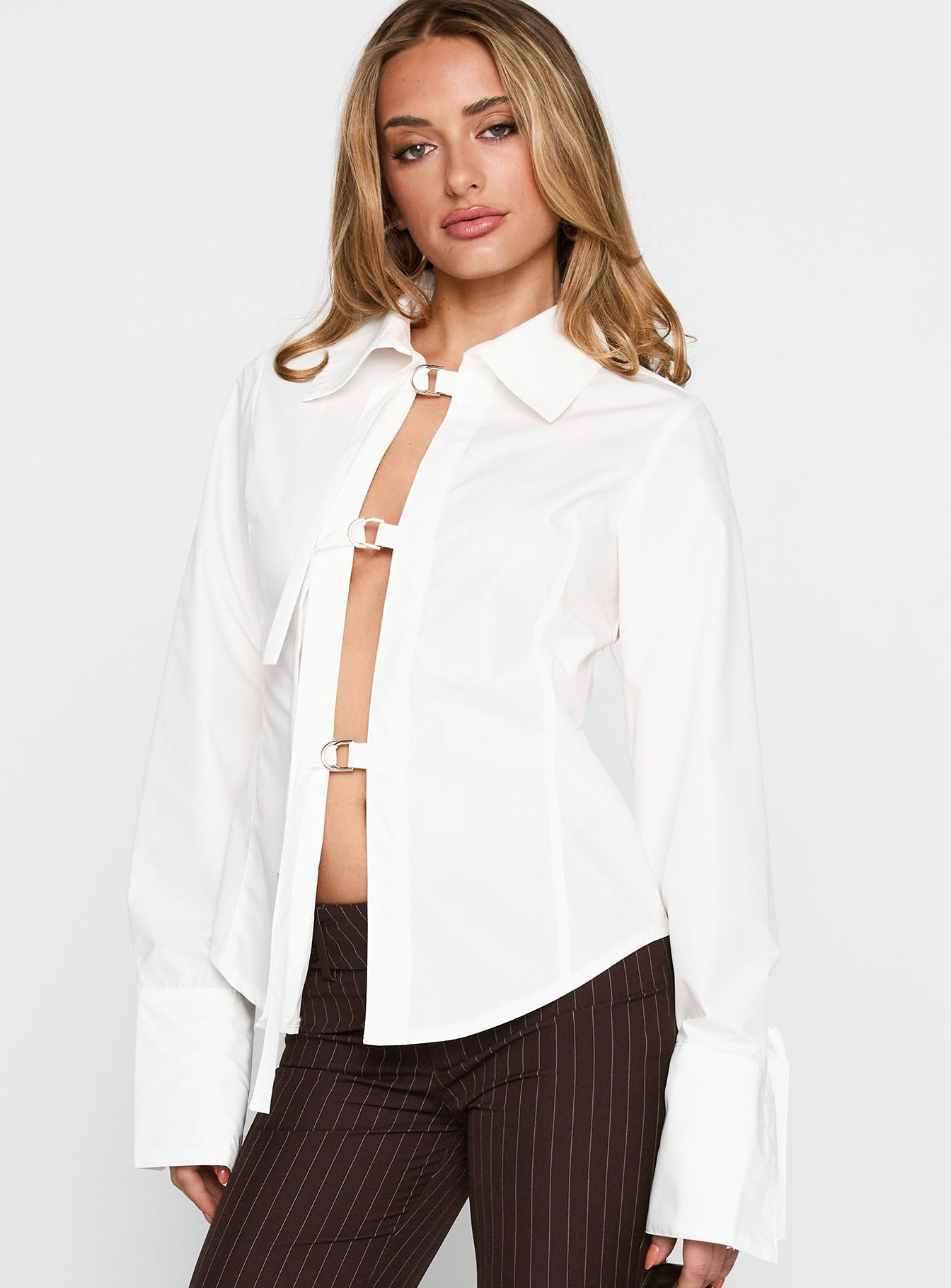 back view of model wearing Princess Polly The Temptation Long Sleeve Top White Full Sleeves High Neck 
