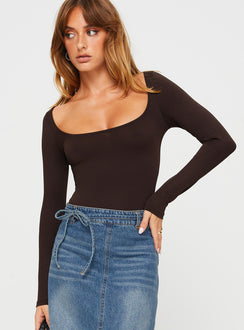front view of model wearing Princess Polly Ellery Bodysuit Brown Tall Full Sleeves 