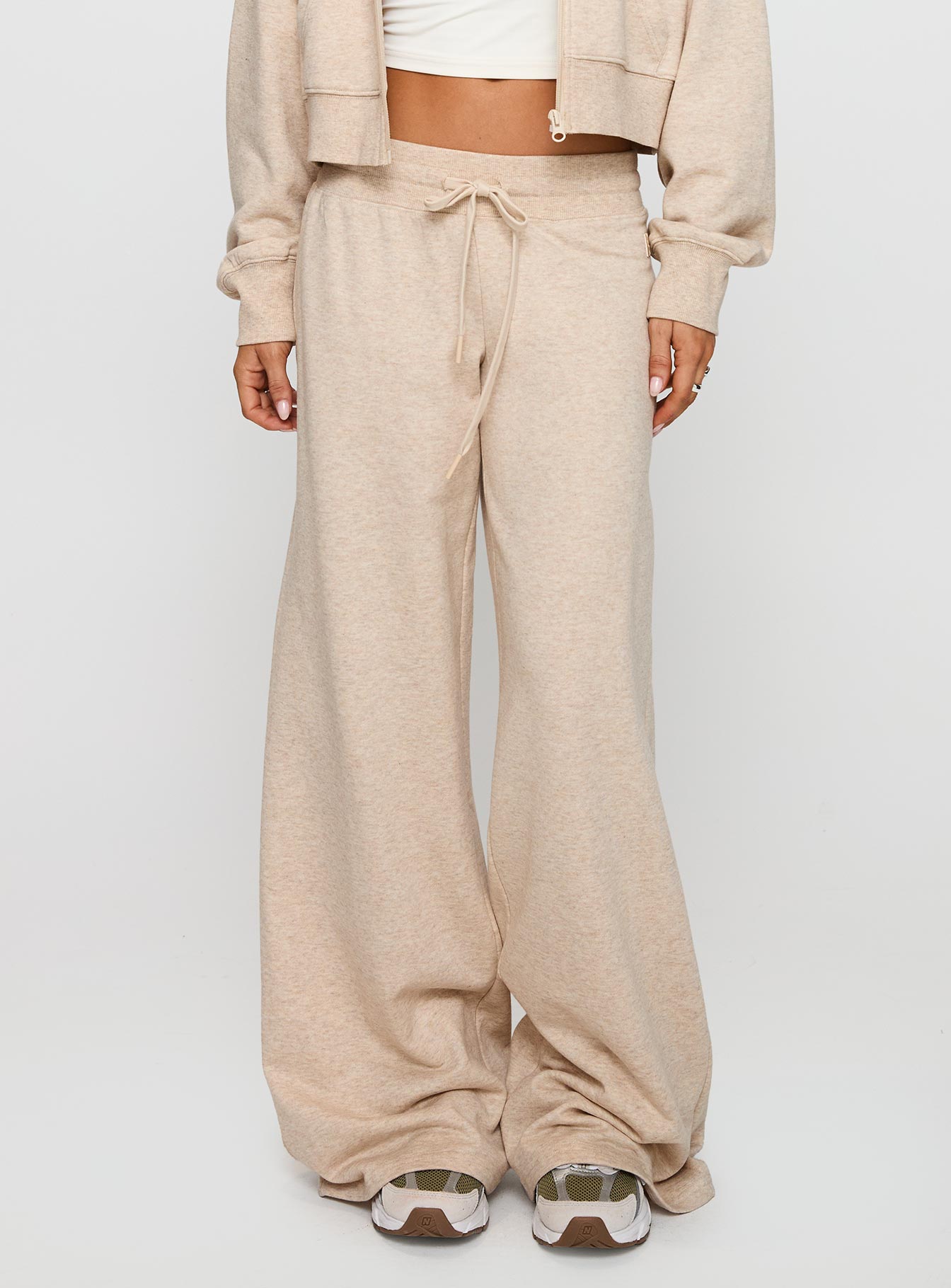 side view of model wearing Princess Polly Mindful Low Rise Pant Oat Marle 